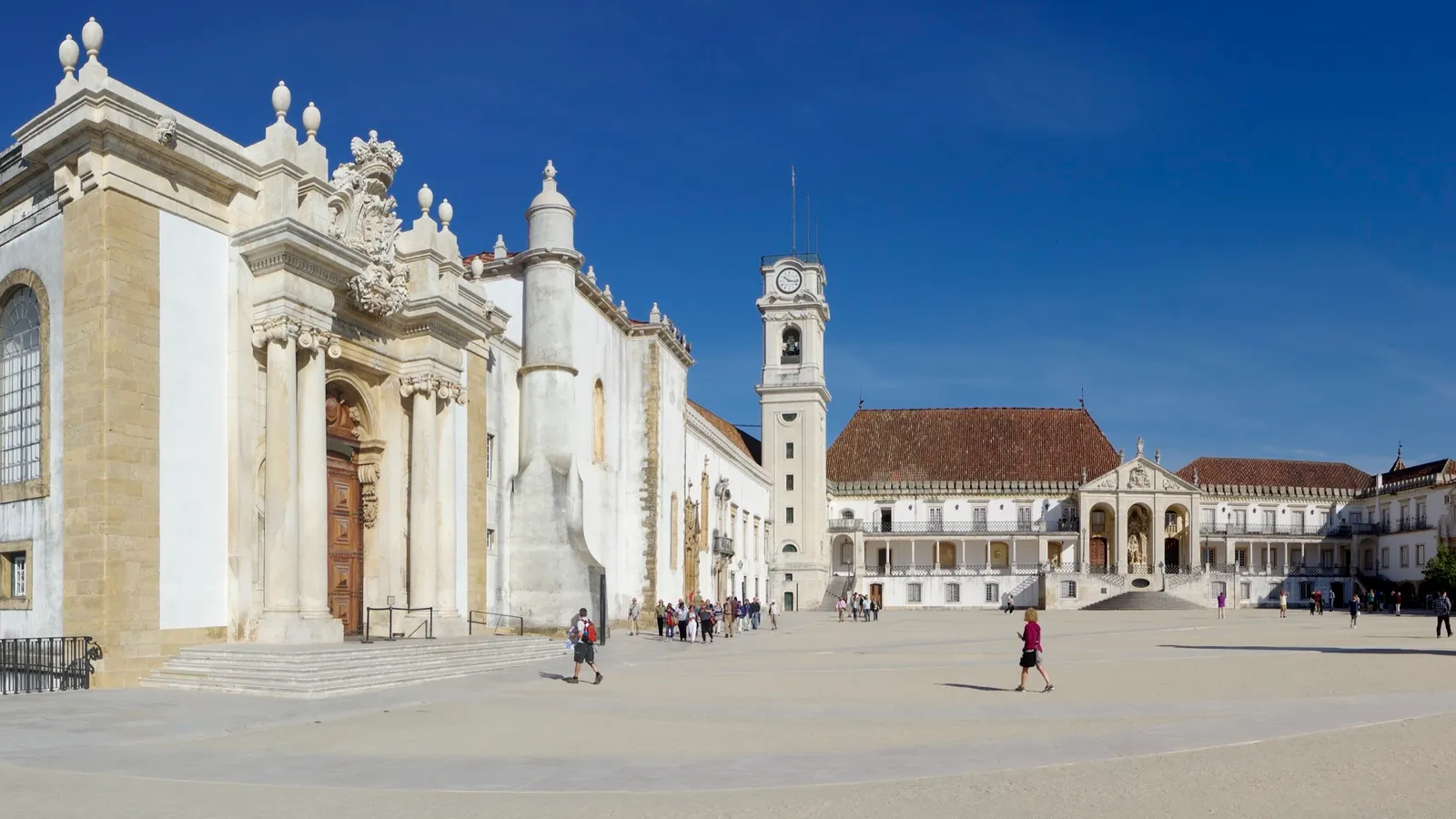 University of Coimbra's historic square and clock tower, a classic Portuguese city landmark