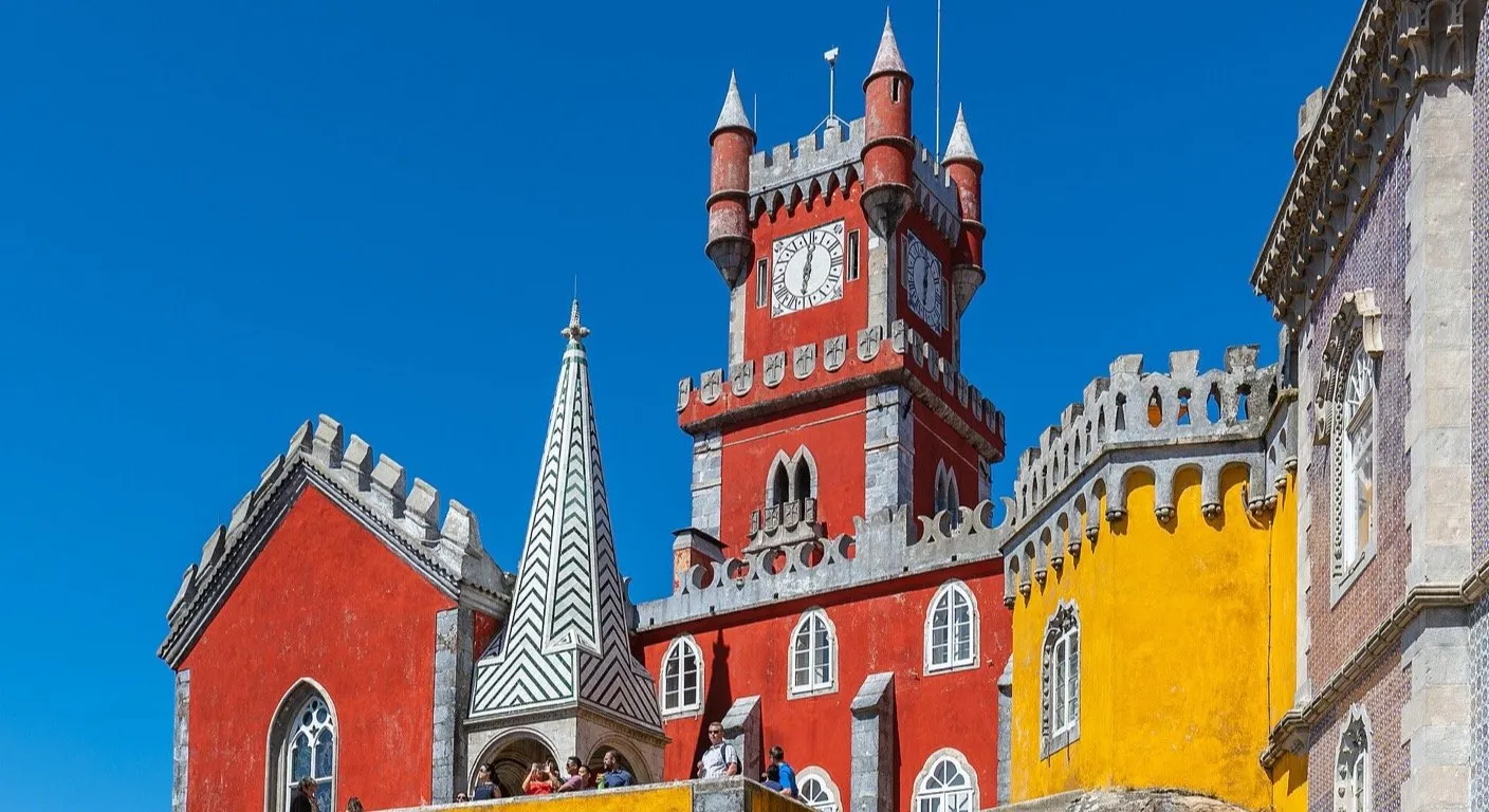 Pena Palace red and yellow towers in Sintra, Portugal — a day trip from Lisbon