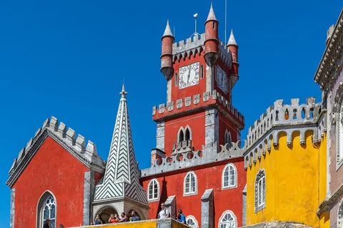 Pena Palace red and yellow towers in Sintra, Portugal — a day trip from Lisbon