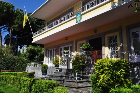 Ukrainian flag flying outside the Embassy of Ukraine in Lisbon, Portugal