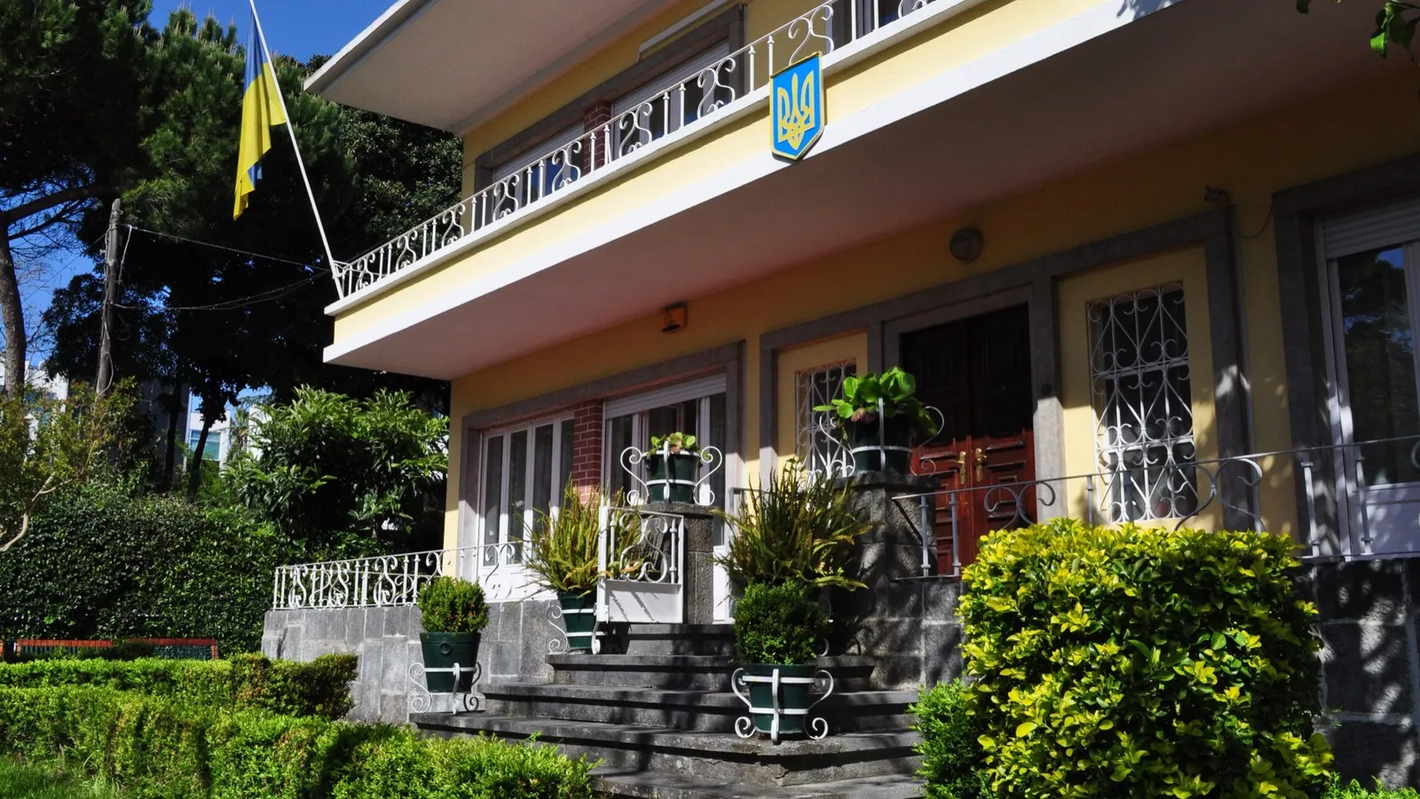 Ukrainian flag flying outside the Embassy of Ukraine in Lisbon, Portugal