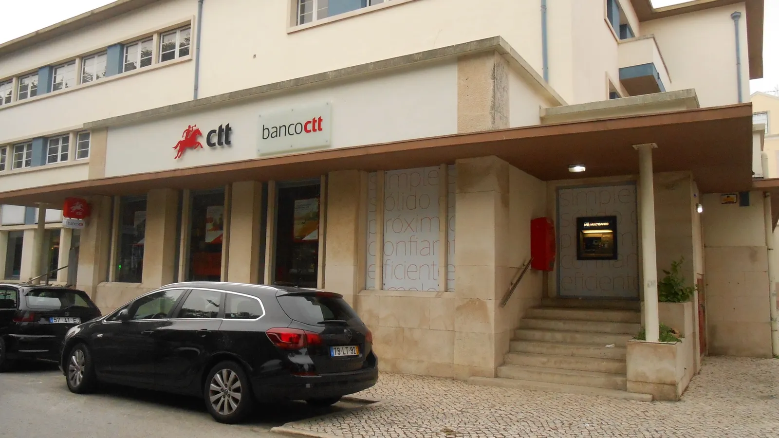 Banco CTT branch storefront with a Multibanco ATM in Figueira da Foz, Portugal