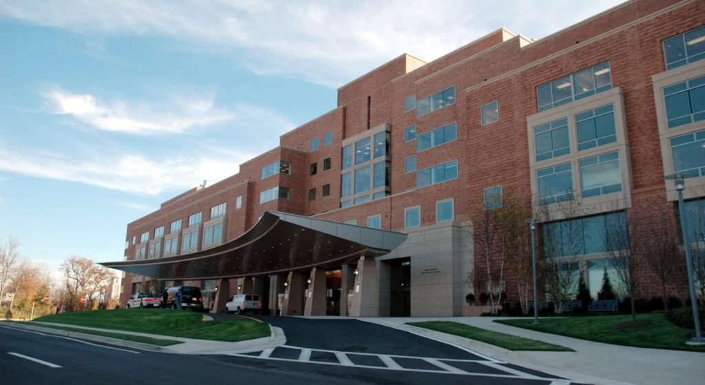 Modern hospital building exterior — SNS registration Portugal guide