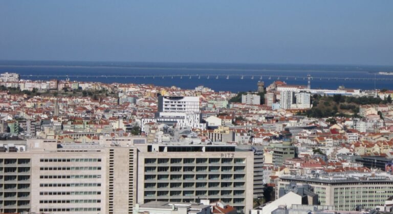 Modern Lisbon city skyline with office buildings — D3 visa Portugal for highly qualified workers