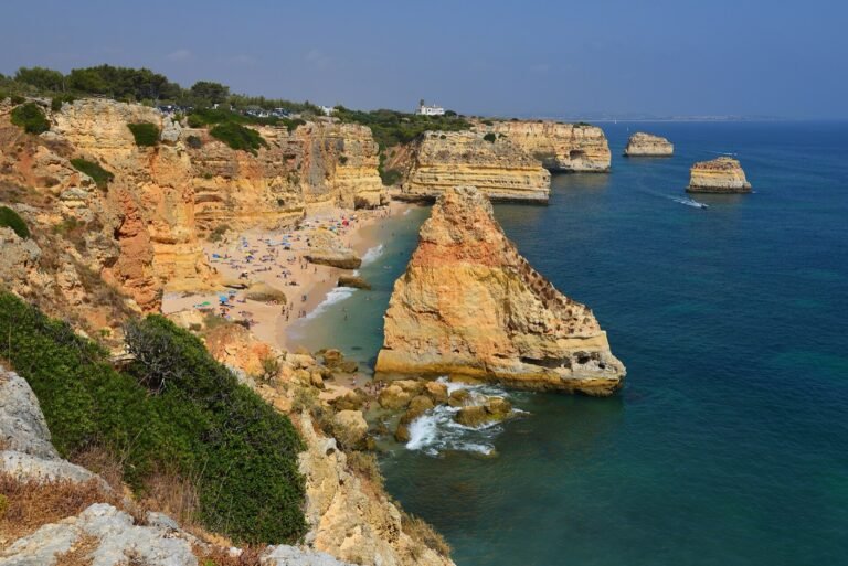 Praia da Marinha golden cliffs and turquoise water — best beaches in Portugal 2026