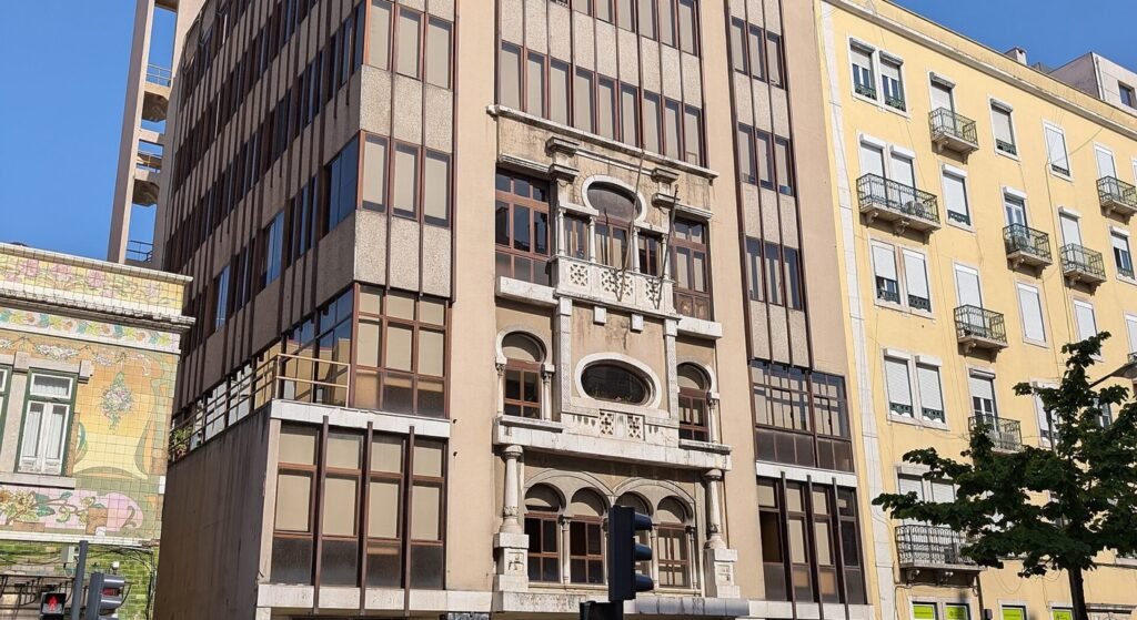 Apartment buildings with azulejo tiles and balconies on Avenida Almirante Reis, Lisbon — renting an apartment in Portugal